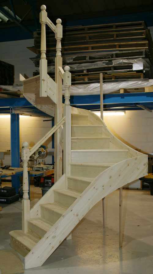 A double winder Staircase in engineered Pine