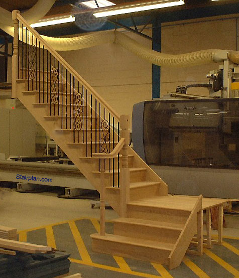 Oak cut string stairs
